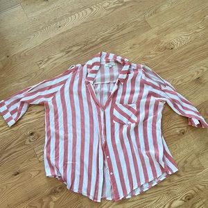 Pink and white striped blouse with open shoulders